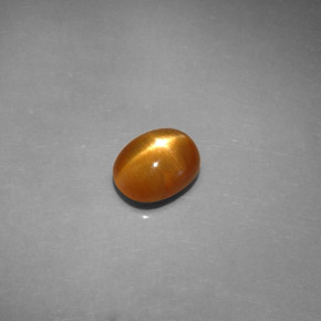 Pierre de soleil étoilée brun doré naturelle coupe ovale, 1,42 ct, opaque