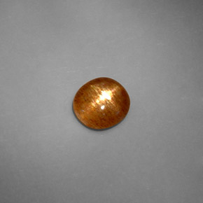 Pierre de soleil étoilée Brun doré naturelle Coupe ovale, 1.37 ct, Opaque