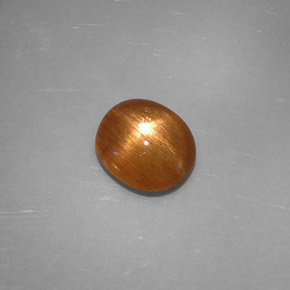 Pierre de soleil étoilée Brun doré naturelle Coupe ovale, 1.24 ct, Opaque