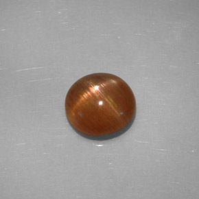 Pierre de soleil étoilée brun doré naturelle coupe ovale, 1,49 ct, opaque