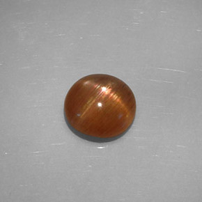 Pierre de soleil étoilée brun doré naturelle coupe ovale, 1,49 ct, opaque
