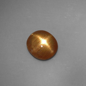 Pierre de soleil étoilée marron doré naturelle coupe ovale, 1,32 ct, opaque