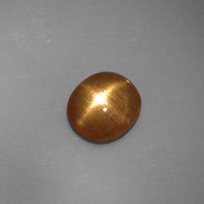Pierre de soleil étoilée marron doré naturelle coupe ovale, 1,32 ct, opaque