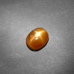 Pierre de soleil étoilée marron doré naturelle coupe ovale, 1,21 ct, opaque