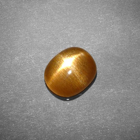 Pierre de soleil étoilée Brun doré naturelle Coupe ovale, 0.94 ct, Opaque