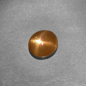 Pierre de soleil étoilée marron naturelle coupe ovale, 0,79 ct, opaque