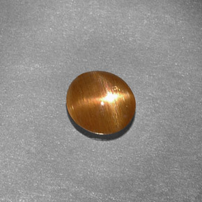 Pierre de soleil étoilée marron naturelle coupe ovale, 0,79 ct, opaque