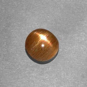 Pierre de soleil étoilée Brun doré naturelle Coupe ovale, 0.65 ct, Opaque