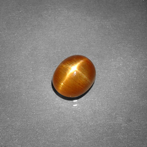 Pierre de soleil étoilée marron doré naturelle coupe ovale, 1,49 ct, opaque