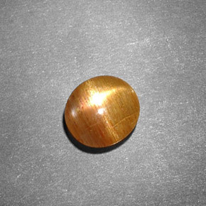 Pierre de soleil étoilée marron naturelle coupe ovale, 0,99 ct, opaque