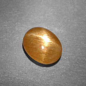 Pierre de soleil étoilée Brun doré naturelle Coupe ovale, 1.22 ct, Opaque