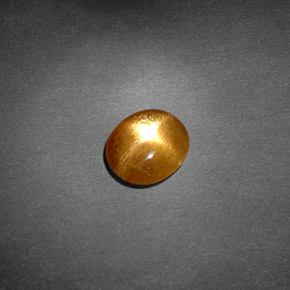 Pierre de soleil étoilée Brun doré naturelle Coupe ovale, 0.77 ct, Opaque