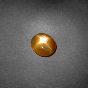 Pierre de soleil étoilée Brun doré naturelle Coupe ovale, 0.77 ct, Opaque