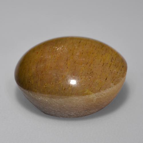 Pierre de soleil étoilée Caramel brun naturelle Coupe ovale, 12.74 ct, Opaque