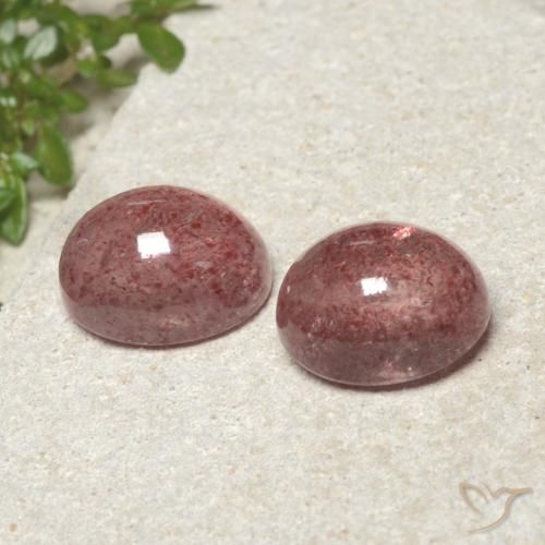 Shop natural 9.40ct Rose moyen Quartz fraise gems, ovale, from Russie at GemSelect. In stock, global shipping!