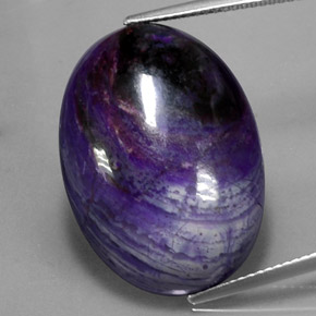 Sugilite multicolore naturelle coupe ovale, 27,34 ct, opaque