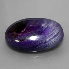 Sugilite multicolore naturelle coupe ovale, 27,34 ct, opaque