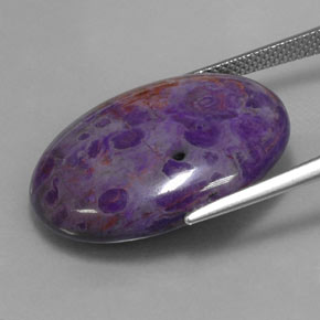 Sugilite multicolore naturelle coupe ovale, 21,13 ct, opaque