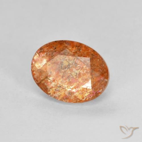Pierre de soleil Orange rougeâtre naturelle ovale, 1.31 ct, Translucide