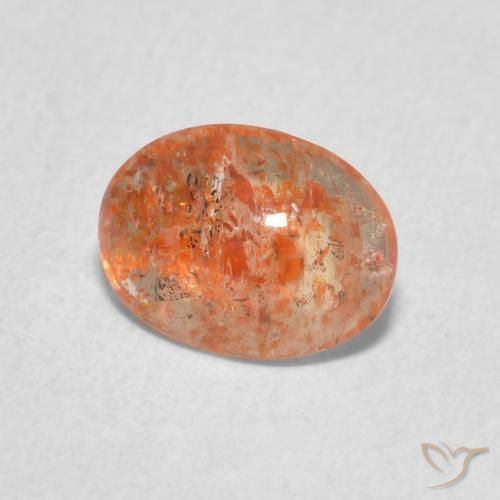 Pierre de soleil Orange pamplemousse naturelle ovale, 0.86 ct, Translucide