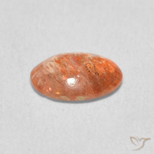 Pierre de soleil Orange pamplemousse naturelle ovale, 0.86 ct, Translucide