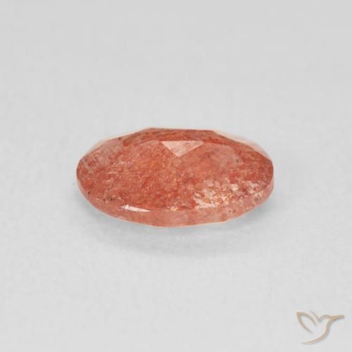 Pierre de soleil Orange rougeâtre naturelle ovale, 0.91 ct, Translucide