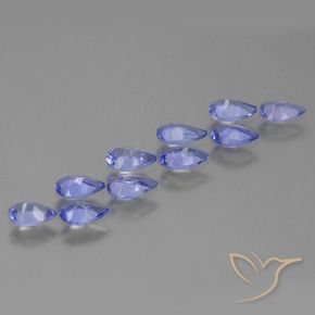 Shop natural 1.93ct Bleu violet intense Tanzanite gems, En forme de poire, from Tanzanie at GemSelect. In stock, global shipping!