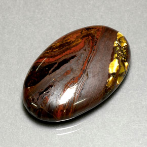 Tiger's eye matrix multicolore naturelle coupe ovale, 35,49 ct, opaque