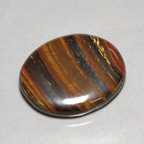 Tiger's eye matrix multicolore naturelle coupe ovale, 53,09 ct, opaque