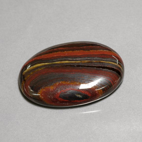 Tiger's eye matrix multicolore naturelle coupe ovale, 45,58 ct, opaque