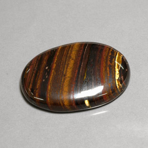 Tiger's eye matrix multicolore naturelle coupe ovale, 43,53 ct, opaque