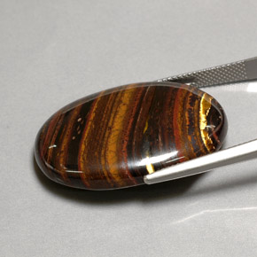 Tiger's eye matrix multicolore naturelle coupe ovale, 43,53 ct, opaque