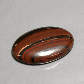 Tiger's eye matrix multicolore naturelle coupe ovale, 35,01 ct, opaque