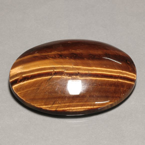 Tiger's eye marron naturelle coupe ovale, 74,22 ct, opaque