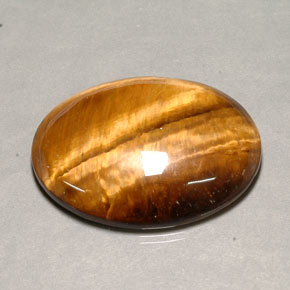 Oeil de Tigre Or Brun naturelle Coupe ovale, 80.37 ct, Opaque