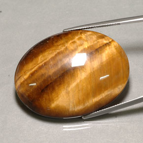 Oeil de Tigre Or Brun naturelle Coupe ovale, 80.37 ct, Opaque