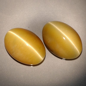 Achetez naturel ct jaune tiger's eye gems, coupe ovale, en provenance namibie chez gemselect. en stock, livraison internationale!