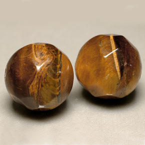 Achetez naturel ct marron tiger's eye gems, sphère / boule, en provenance thaïlande chez gemselect. en stock, livraison internationale!