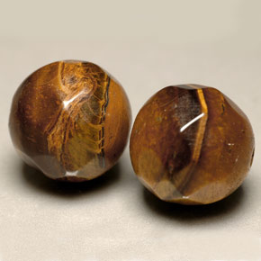 Achetez naturel ct marron tiger's eye gems, sphère / boule, en provenance thaïlande chez gemselect. en stock, livraison internationale!
