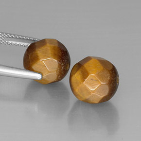 Achetez naturel ct Or Brun Oeil de Tigre gems, Sphère / Boule, En provenance Thaïlande chez GemSelect. En stock, livraison internationale!