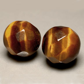 Achetez naturel ct Or Brun Oeil de Tigre gems, Sphère / Boule, En provenance Thaïlande chez GemSelect. En stock, livraison internationale!