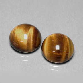 Achetez naturel ct marron tiger's eye gems, coupe roude, en provenance thaïlande chez gemselect. en stock, livraison internationale!