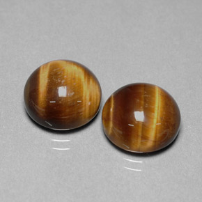 Achetez naturel ct marron tiger's eye gems, coupe roude, en provenance thaïlande chez gemselect. en stock, livraison internationale!