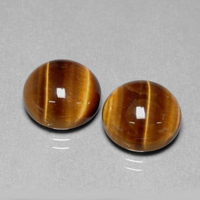 Achetez naturel ct marron tiger's eye gems, coupe roude, en provenance thaïlande chez gemselect. en stock, livraison internationale!