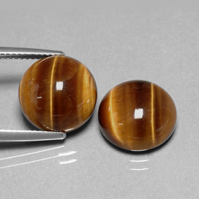Achetez naturel ct marron tiger's eye gems, coupe roude, en provenance thaïlande chez gemselect. en stock, livraison internationale!