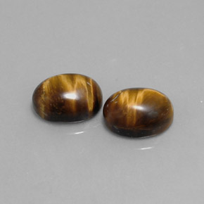 Achetez naturel ct marron tiger's eye gems, coupe ovale, en provenance thaïlande chez gemselect. en stock, livraison internationale!