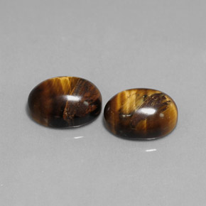 Achetez naturel ct marron tiger's eye gems, coupe ovale, en provenance thaïlande chez gemselect. en stock, livraison internationale!