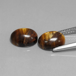 Achetez naturel ct marron tiger's eye gems, coupe ovale, en provenance thaïlande chez gemselect. en stock, livraison internationale!