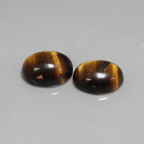 Achetez naturel ct Or Brun Oeil de Tigre gems, Coupe ovale, En provenance Thaïlande chez GemSelect. En stock, livraison internationale!