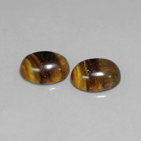 Achetez naturel ct marron tiger's eye gems, coupe ovale, en provenance thaïlande chez gemselect. en stock, livraison internationale!